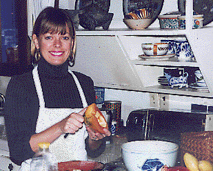 [Teri Arnold whipping up a gourmet meal in the Mexican colonial style restaurant and bakery at La Puerta Roja, Alamos, Sonora, Mexico: 42k]